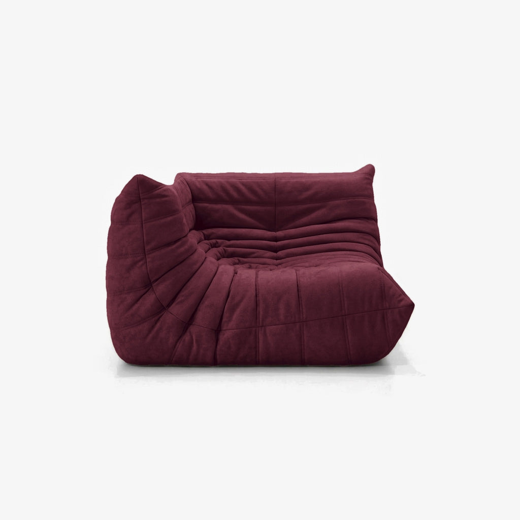 Module d'angle ANGELO effet daim Grenat, vue de trois-quarts côté assise