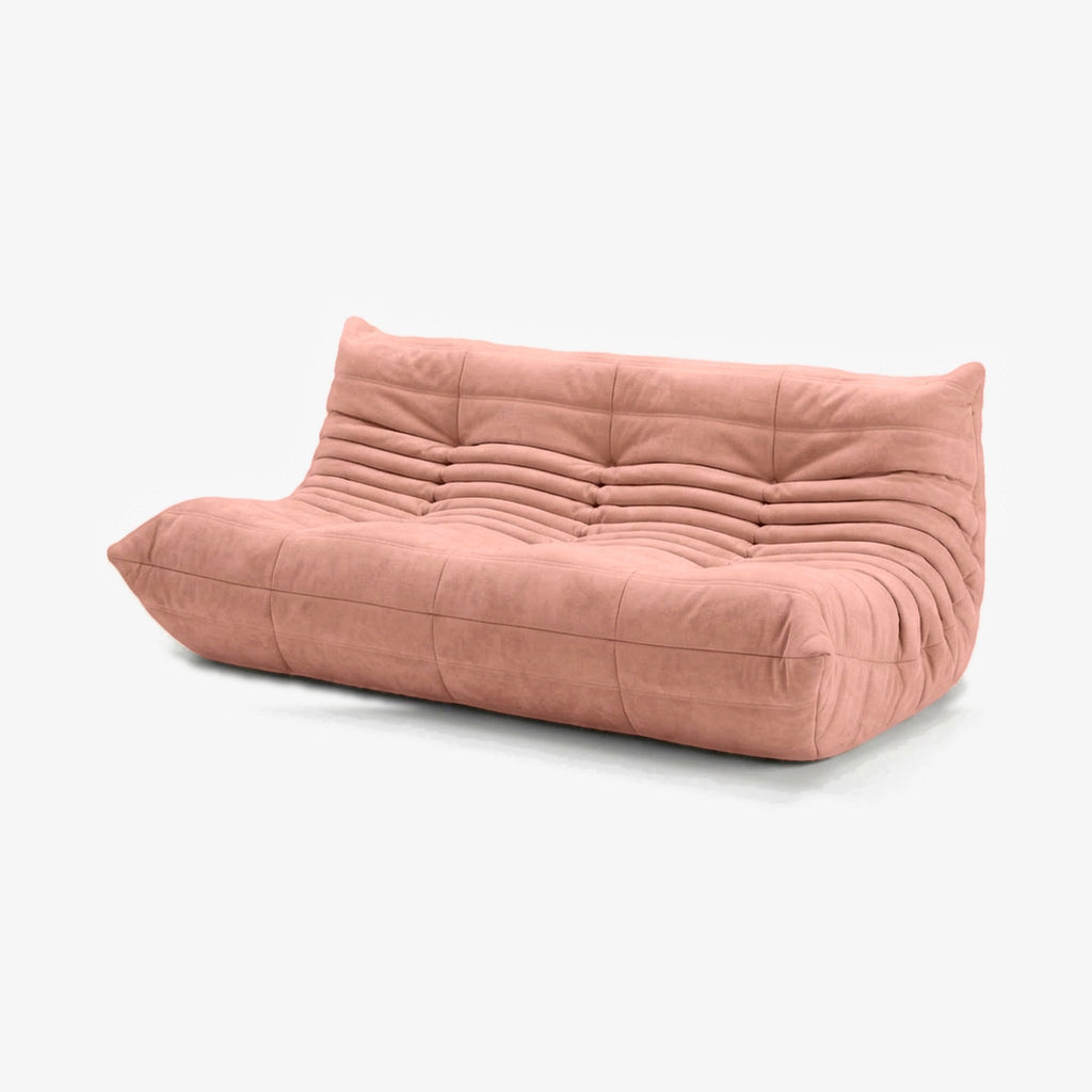 Canapé MARA effet daim Rose, vue de trois-quarts avant droit